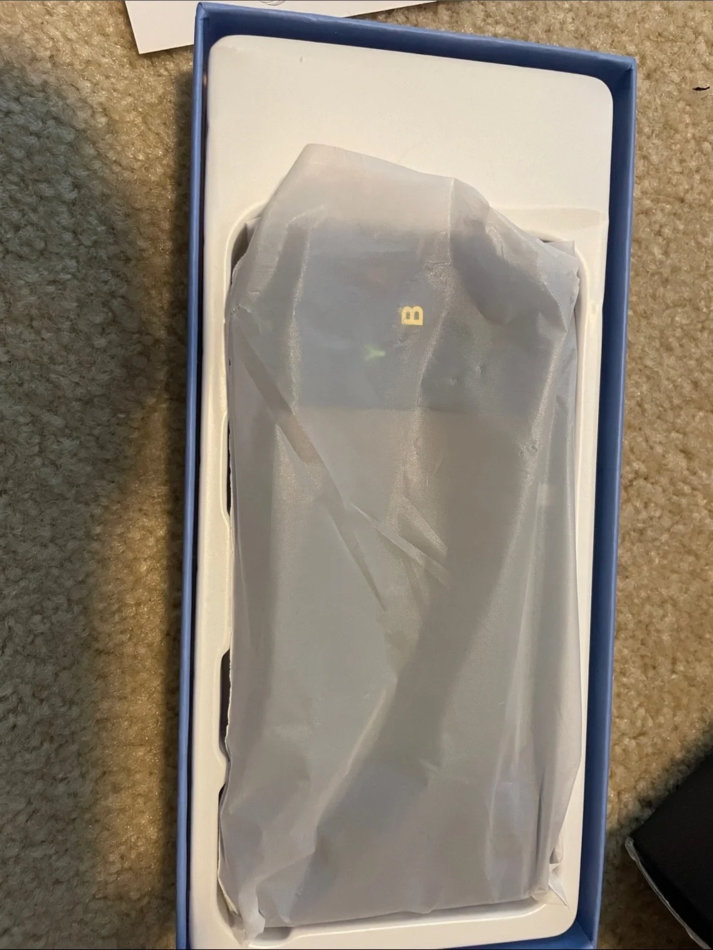 Transparent Blue Handheld Gaming Console with Dual Analog Sticks